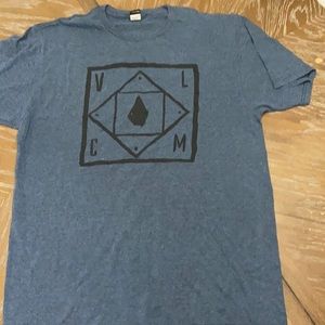 Blue and black volcom shirt